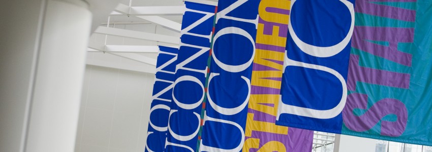 UConn Stamford banners haning in the Stamford campus atrium